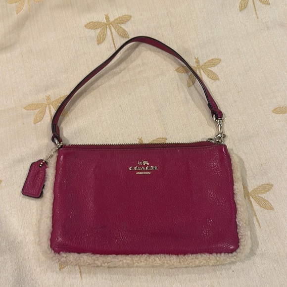 Coach Handbags - Coach Sherpa Shearling Trim Pebbled Leather Cranberry / Raspberry Pink Wristlet.